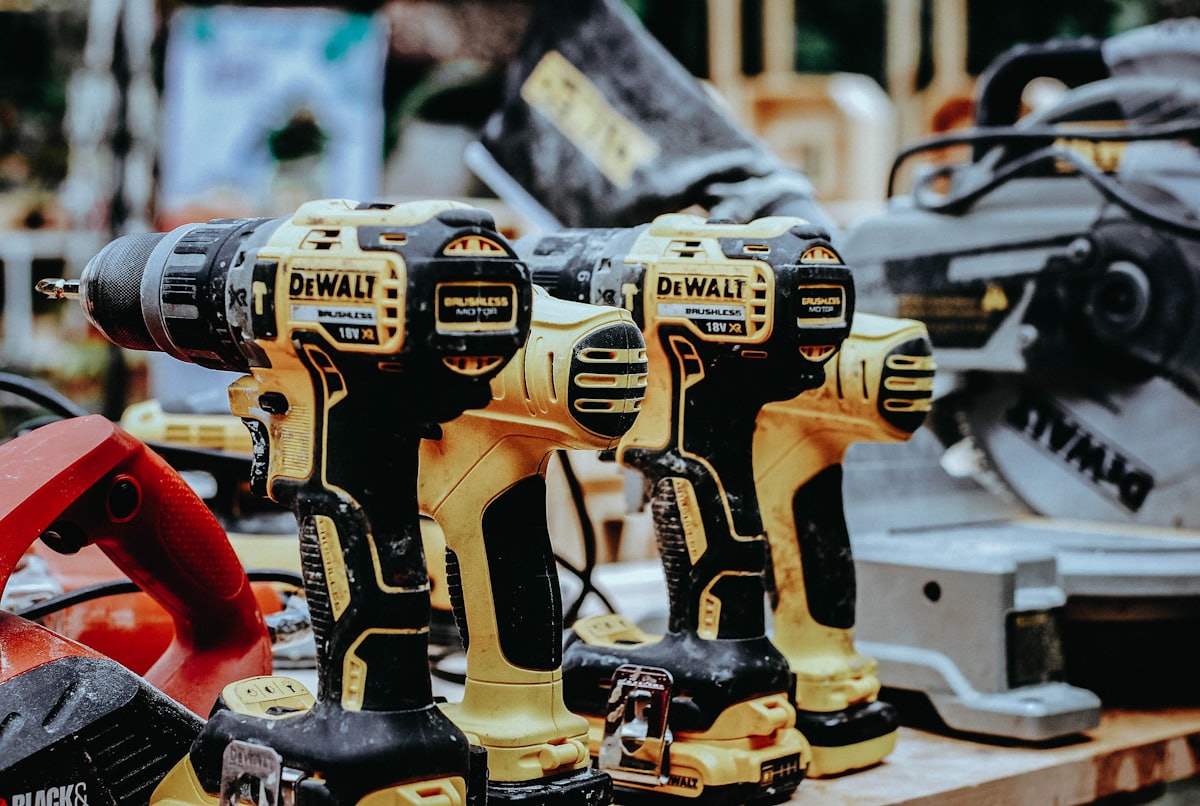 Power tools laid out on a workbench